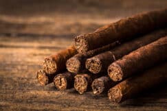 quality cigars for relaxing on an old wooden table